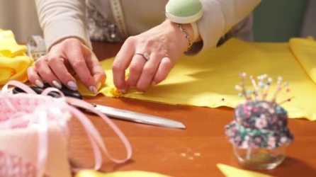 depositphotos_177325934-stock-video-hand-of-a-young-seamstress