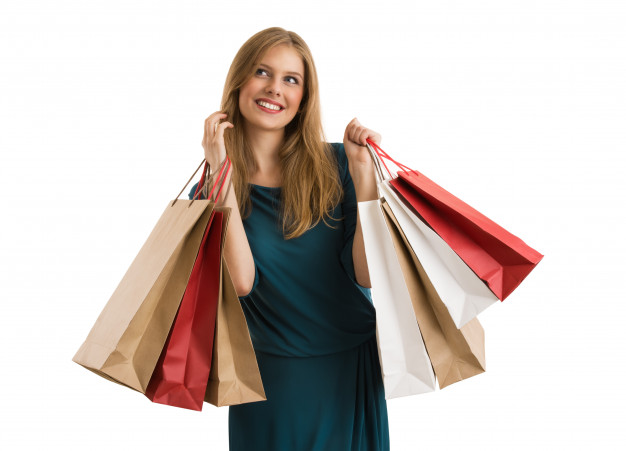 mulher-comprando-segurando-sacos-de-compras-olhando-para-cima_19485-2302